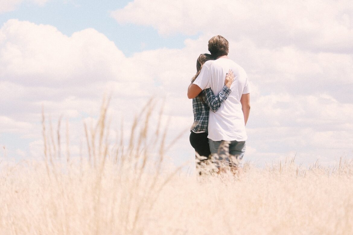 Couple embracing in a wheat field, just know that choosing right makes a difference when choosing whom to date.