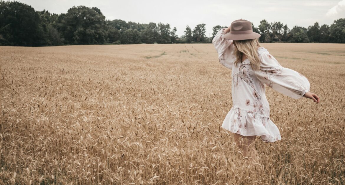 In a golden prairie field a young woman understands it's time for her to stop tolerating unacceptable behavior so she can enjoy the beauty of life.